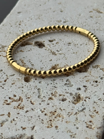 Bracciale Camelia  con apertura laterale - oro