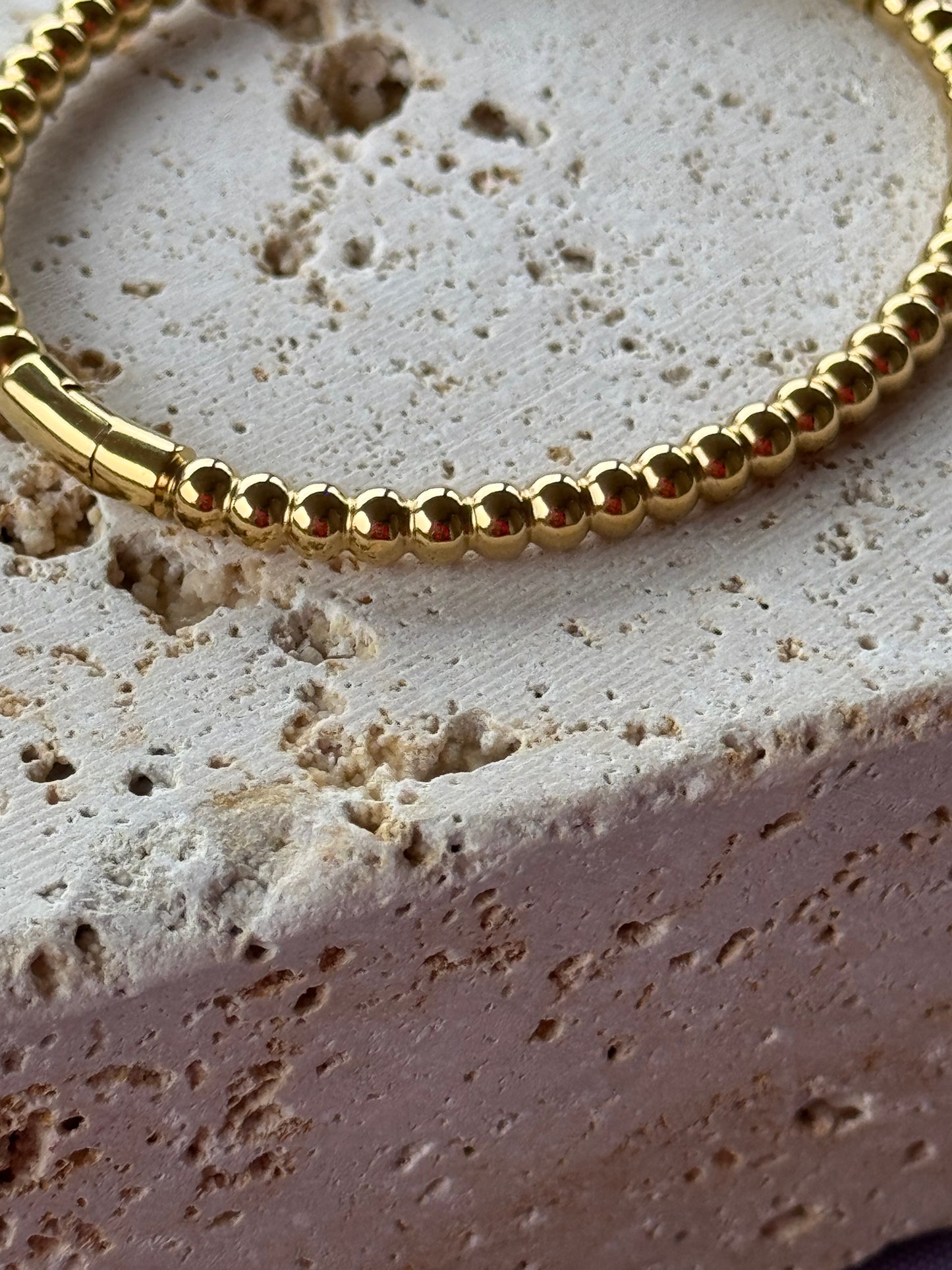 Bracciale Camelia  con apertura laterale - oro