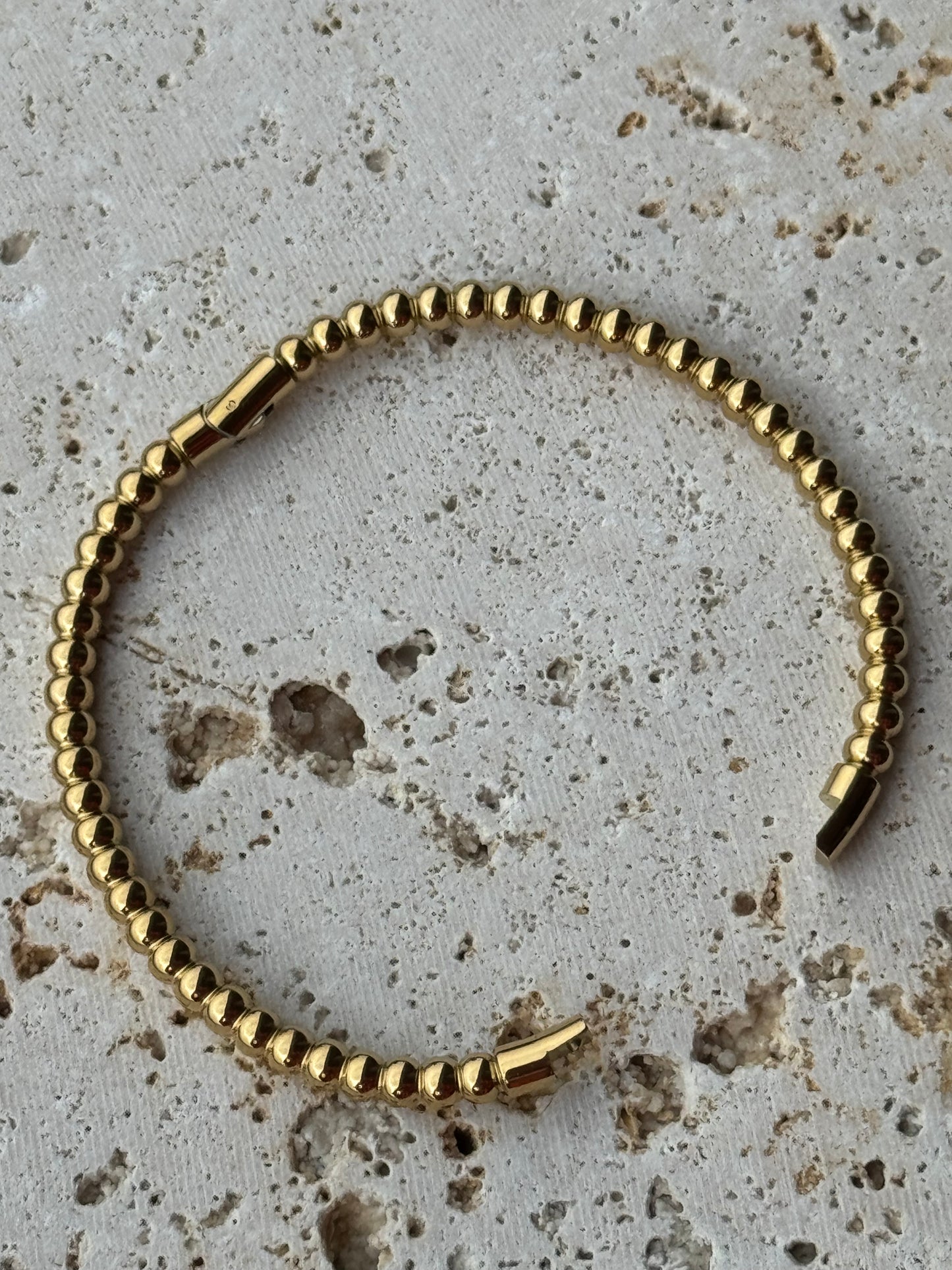 Bracciale Camelia  con apertura laterale - oro